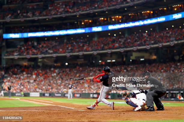 Juan Soto of the Washington Nationals hits a solo home run against the Houston Astros during the fifth inning in Game Six of the 2019 World Series at...