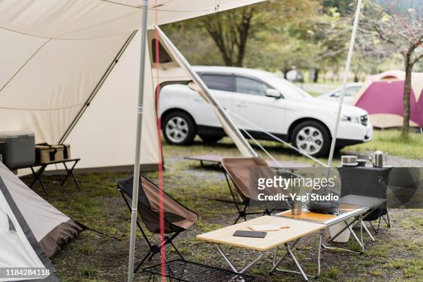 enjoy camping with a car - plane stock-fotos und bilder