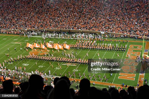 General view of the Clemson Tigers as they take the field following flag-bearers through marching band rows for their homecoming game against the...