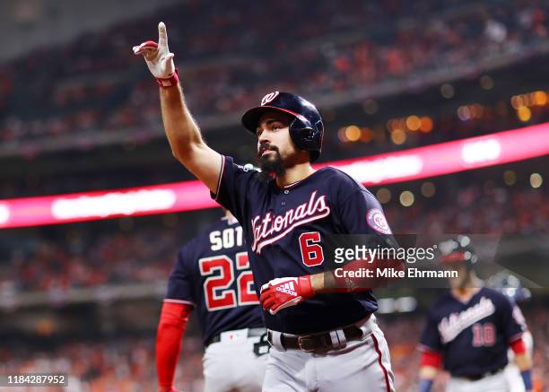 Anthony Rendon of the Washington Nationals celebrates his two-run home run against the Houston Astros during the seventh inning in Game Six of the...