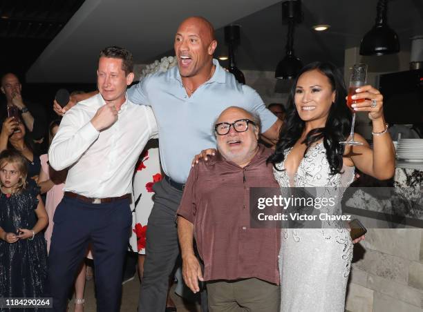 Dwayne Johnson and Danny DeVito of "Jumanji: The Next Level" crash a wedding reception November 23, 2019 in Cabo San Lucas, Mexico.