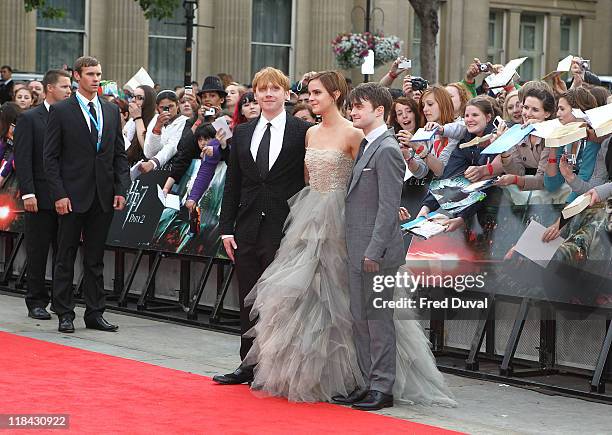 Rupert Grint, Emma Watson and Daniel Radcliffe attend the world premiere of 'Harry Potter And The Deathly Hallows Part 2' at Trafalgar Square on July...