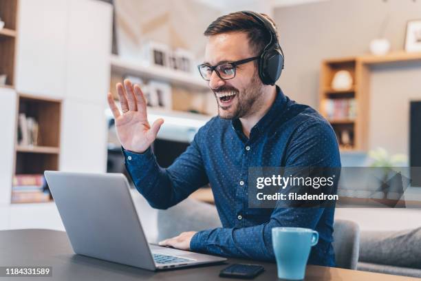 business video conference - man introducing himself stock pictures, royalty-free photos & images