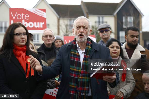 Labour Party leader Jeremy Corbyn, holds his party's manifesto as he speaks to supporters during a visit to Thurrock in Essex whilst on the General...