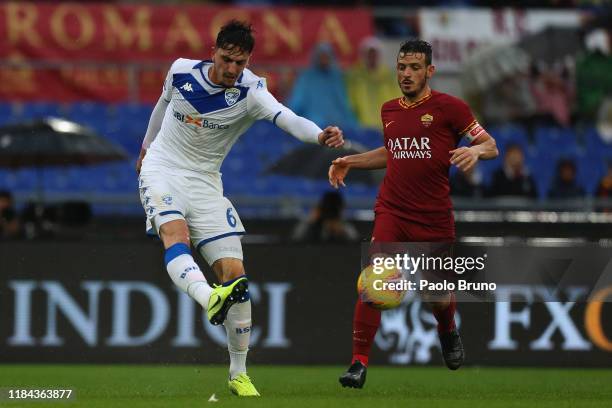 Alessandro Florenzi of AS Roma competes for the ball with Emanuele Endoj of Brescia Calcio during the Serie A match between AS Roma and Brescia...