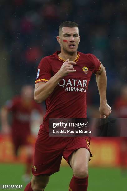 Edin Dzeko of AS Roma in action during the Serie A match between AS Roma and Brescia Calcio at Stadio Olimpico on November 24, 2019 in Rome, Italy.