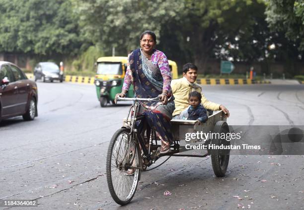 Family On Rickshaw Photos and Premium High Res Pictures - Getty Images