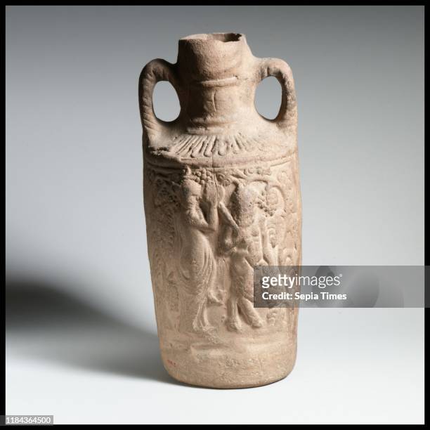 Terracotta amphora , Mid-Imperial, 2nd-3rd century A.D., Roman, Terracotta; Cnidian relief ware, H. 10 3/8 in. , Vases, This vessel was made at...