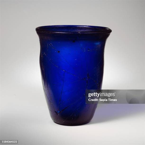 Glass beaker, Late Imperial, 4th century A.D., Roman, Glass; blown, H.: 5 7/16 in. , Glass, Translucent deep cobalt blue. Outsplayed and thickened...