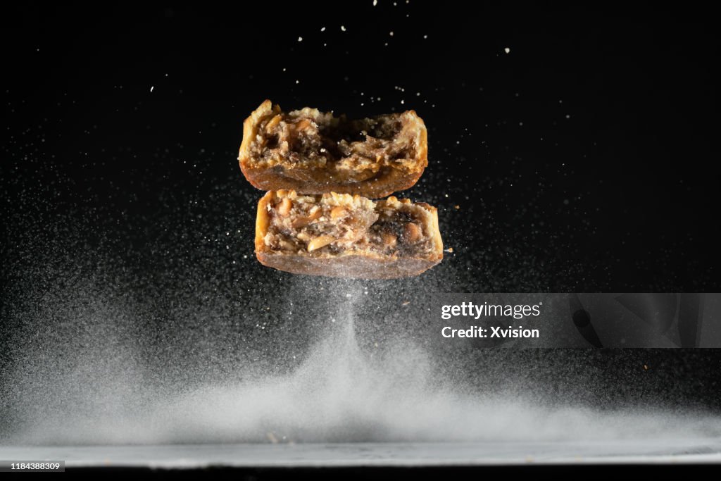 Mooncake flying in mid air captured with high speed sync."n