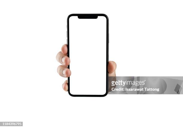 close up hand hold phone isolated on white, mock-up smartphone white color blank screen - auf sich zeigen stock-fotos und bilder