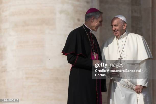 Pope Francis talks to Prefect of the Papal household, Georg Ganswein during his general weekly audience in St. Peter's Square on October 30, 2019 in...