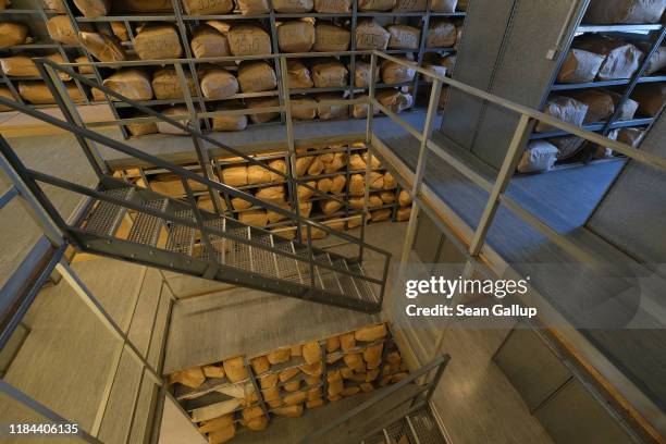 Sacks of torn documents of the former East German secret police, the Stasi, lie in storage at a facility of the Federal Commissioner for the Records...