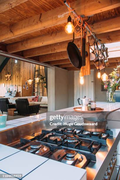 kitchen interior of a cafe like setting in scandinavian midcentury modern design. - table setting design scandinavian imagens e fotografias de stock