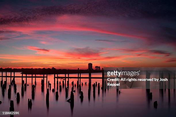 sunset beach - gulf coast stockfoto's en -beelden