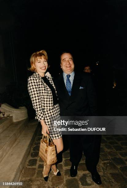 Karen Cheryl et Paul-Loup Sulitzer à la soirée Daniel Hechter pour le lancement de son nouveau parfum, à Paris, France le 29 mai 1997.