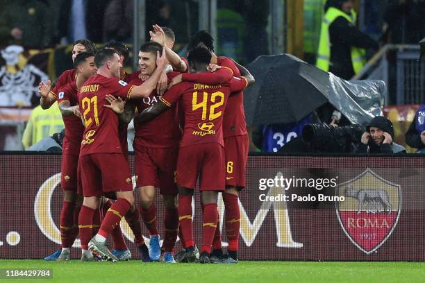 Gianluca Mancini with his teammates of AS Roma celebrates after scoring the team's second goal during the Serie A match between AS Roma and Brescia...