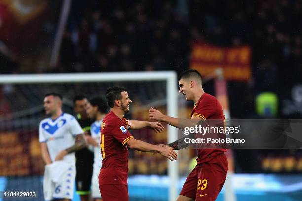 Gianluca Mancini with his teammates of AS Roma celebrates after scoring the team's second goal during the Serie A match between AS Roma and Brescia...