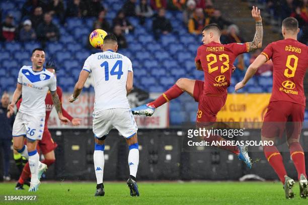 Roma's Italian defender Gianluca Mancini shoots to score his team's second goal during the Italian Serie A football match Roma vs Brescia on November...