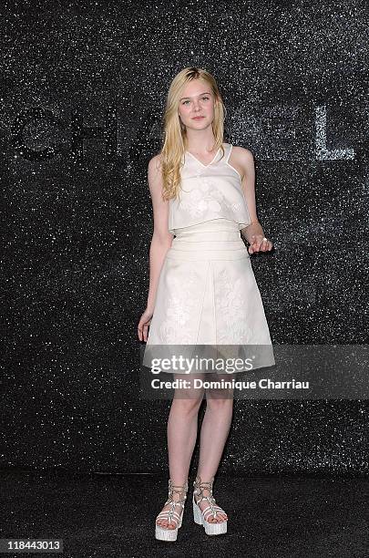 Elle Fanning attends the Chanel Haute Couture Fall/Winter 2011/2012 show as part of Paris Fashion Week at Grand Palais on July 5, 2011 in Paris,...