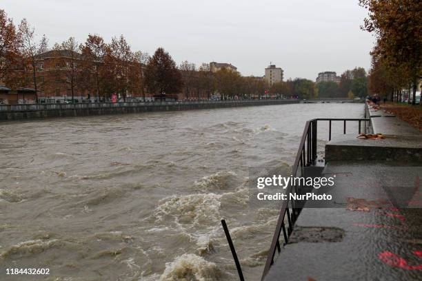 The river Dora Riparia in Turin on November 24, 2019 after its level rose overnight following heavy rain. Heavy rains continued to lash northern...