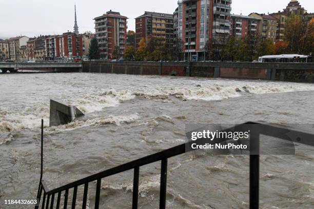 The river Dora Riparia in Turin on November 24, 2019 after its level rose overnight following heavy rain. Heavy rains continued to lash northern...