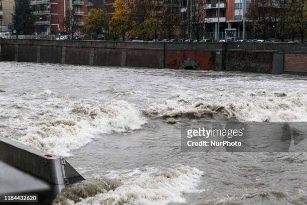 The river Dora Riparia in Turin on November 24, 2019 after its level rose overnight following heavy rain. Heavy rains continued to lash northern...