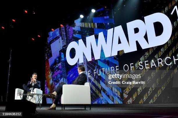 Seth Meyers, Host Late Night with Seth Meyers, and Carl Quintanilla, Anchor at CNBC, speak onstage during ONWARD19: The Future Of Search - Day 3 at...