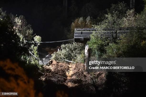 Viaduct section of the A6 highway between Turin and Savona is pictured after it collapsed following a landslide near Savona on November 24, 2019. -...