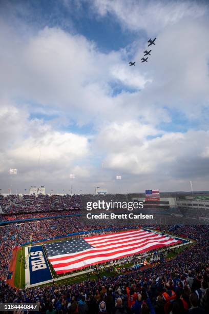 Warthog military aircraft flyover during the national anthem before the game between the Buffalo Bills and the Denver Broncos at New Era Field on...