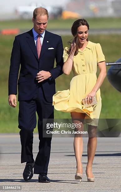 Catherine, Duchess of Cambridge and Prince William, Duke of Cambridge arrive at Calgary Airport on July 7, 2011 in Calgary, Canada. The newly married...