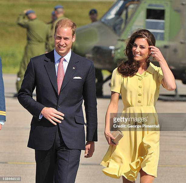 Prince William, Duke of Cambridge and Catherine, Duchess of Cambridge arrive at the Calgary International Airport on July 7, 2011 in Calgary, Canada.