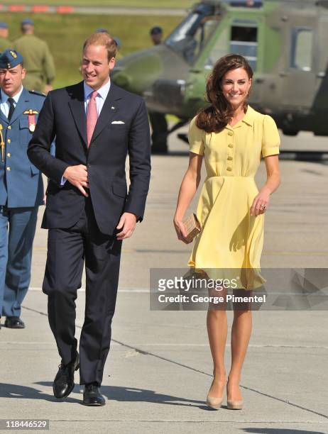 Prince William, Duke of Cambridge and Catherine, Duchess of Cambridge arrive at the Calgary International Airport on July 7, 2011 in Calgary, Canada.