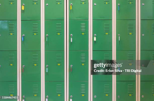 wall of lockers in a dressing room of the gym - vestiaires casier sport photos et images de collection