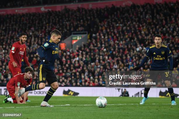 Lucas Torreira of Arsenal scores his team's first goal during the Carabao Cup Round of 16 match between Liverpool and Arsenal at Anfield on October...