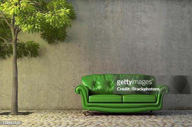Abstract scene with couch on a side walk