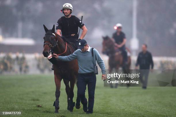 Arcadia Queen and Kolding return after a gallop during the Golden Eagle trackwork session at Rosehill Gardens on October 31, 2019 in Sydney,...