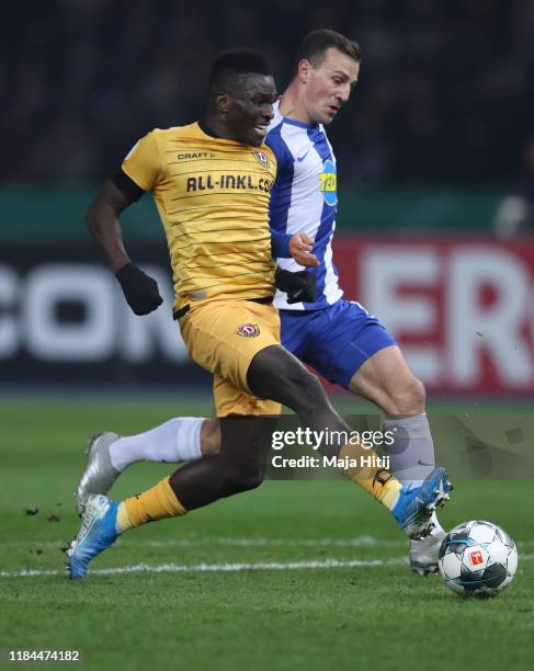 Moussa Kone of Dynamo Dresden scores his team's first goal during the DFB Cup second round match between Hertha BSC and Dynamo Dresden at...