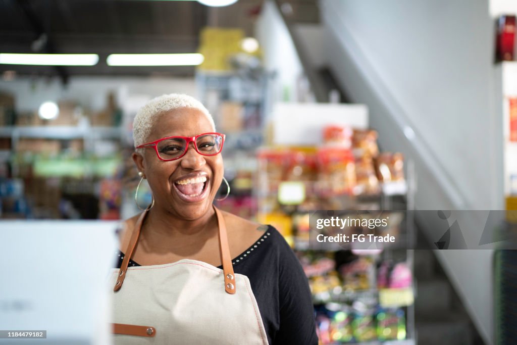 Happy cashier working at wholesale