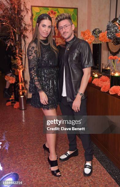 Amber Le Bon and Henry Holland attend Ella Canta's Day of the Dead celebration on October 30, 2019 in London, England.