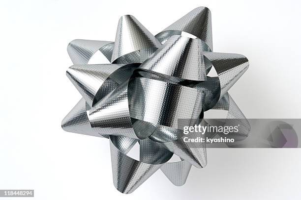 isolated shot of silver christmas bow on white background - bow stockfoto's en -beelden