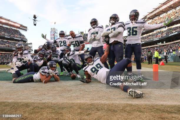 Members of the Seattle Seahawks celebrate after an interception against the Philadelphia Eagles in the fourth quarter at Lincoln Financial Field on...
