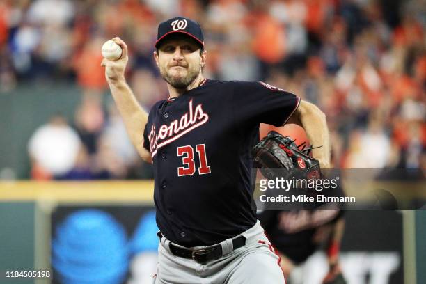 Max Scherzer of the Washington Nationals delivers the pitch against the Houston Astros during the second inning in Game Seven of the 2019 World...
