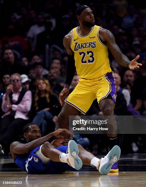 LeBron James of the Los Angeles Lakers reacts to his foul on Kawhi Leonard of the LA Clippers during the fourth quarter in a 112-102 Clipper win in...