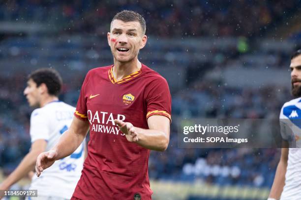 Edin Dzeko of AS Roma seen in action during the Italian Serie A football match between AS Roma and Brescia at the Olympic Stadium in Rome. .