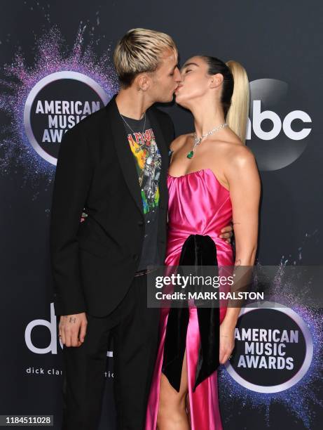 British singer Dua Lipa and US model Anwar Hadid arrive for the 2019 American Music Awards at the Microsoft theatre on November 24, 2019 in Los...