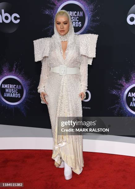 Singer/songwriter Christina Aguilera arrives for the 2019 American Music Awards at the Microsoft theatre on November 24, 2019 in Los Angeles.