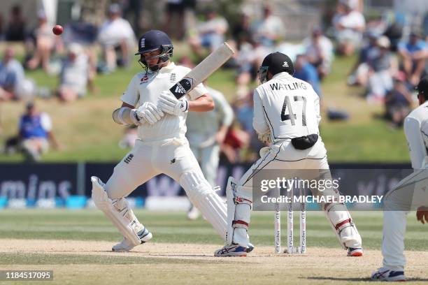 Englands Sam Curran pads the ball away as New Zealands BJ Watling looks on during the fifth day of the first cricket test between England and New...