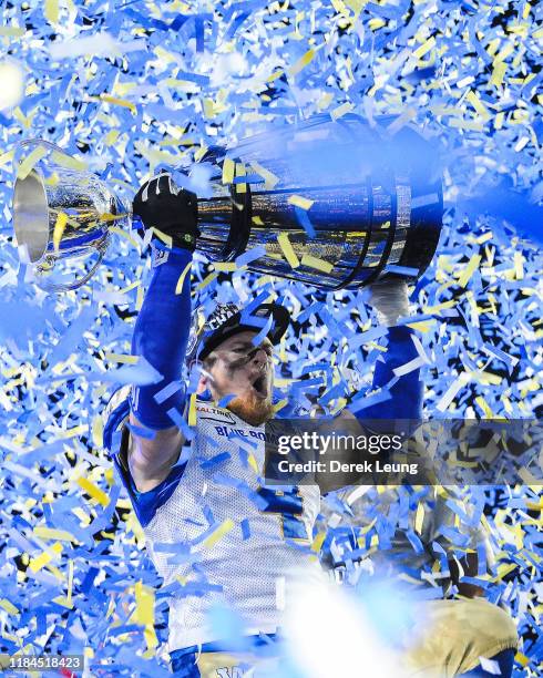 Adam Bighill of the Winnipeg Blue Bombers holds up the Grey Cup after defeating the Hamilton Tiger-Cats during the 107th Grey Cup Championship Game...