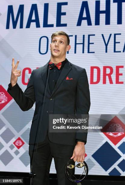 Swimmer Caeleb Dressel receives the Male Athlete award during Golden Goggle Awards on November 24, 2019 in Los Angeles, California.